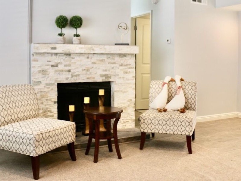 Staged living room with a fireplace